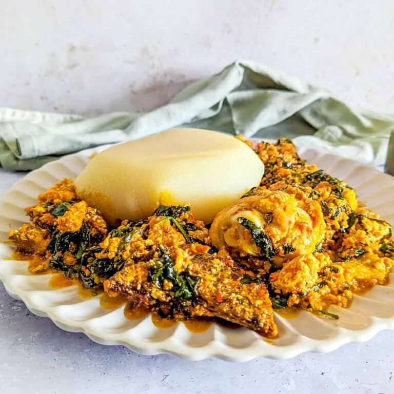 Bowl of Nigerian egusi soup with fufu