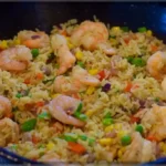 Nigerian fried rice with mixed vegetables and shrimp