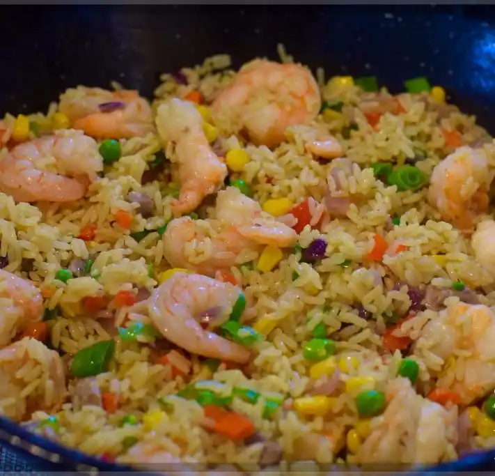 Nigerian fried rice with mixed vegetables and shrimp