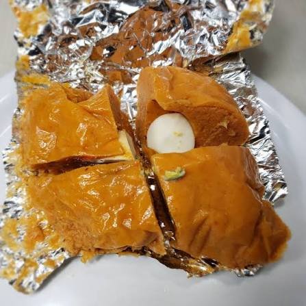 moi moi in foil sliced open